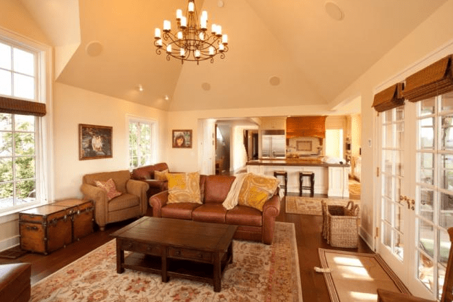 Finished living room with chandelier and furniture