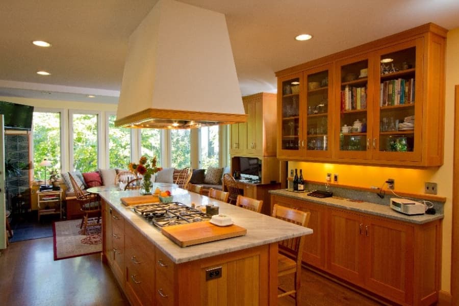 Kitchen With Island And Brown Cabinets