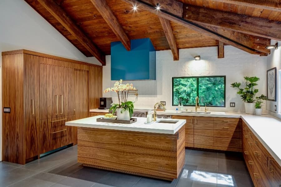 Kitchen With Wooden Cabinets And Ceiling