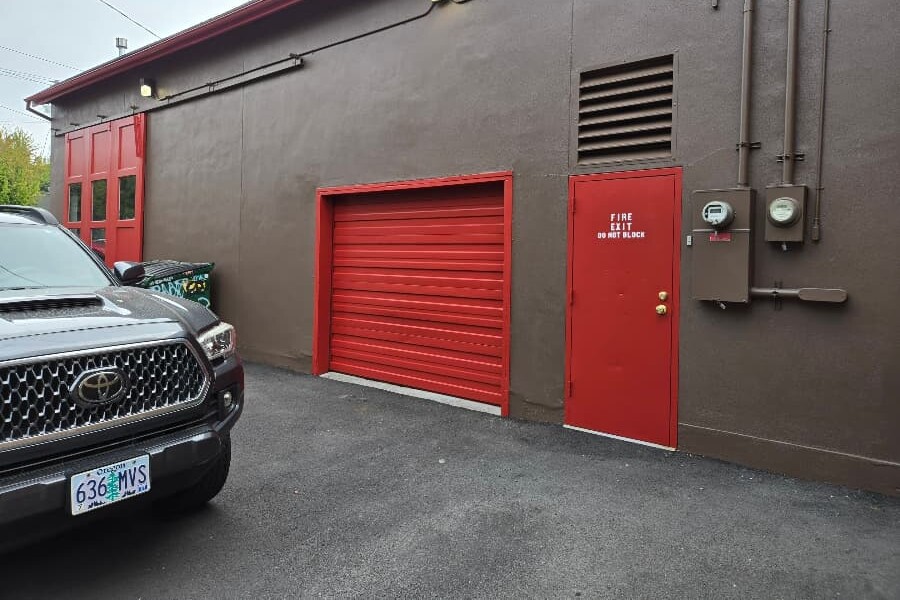 Exterior commercial garage paint job, side view