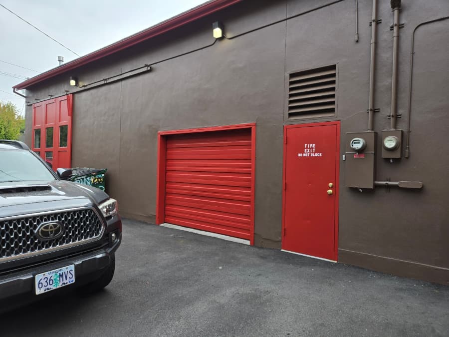 Exterior commercial garage paint job, side view