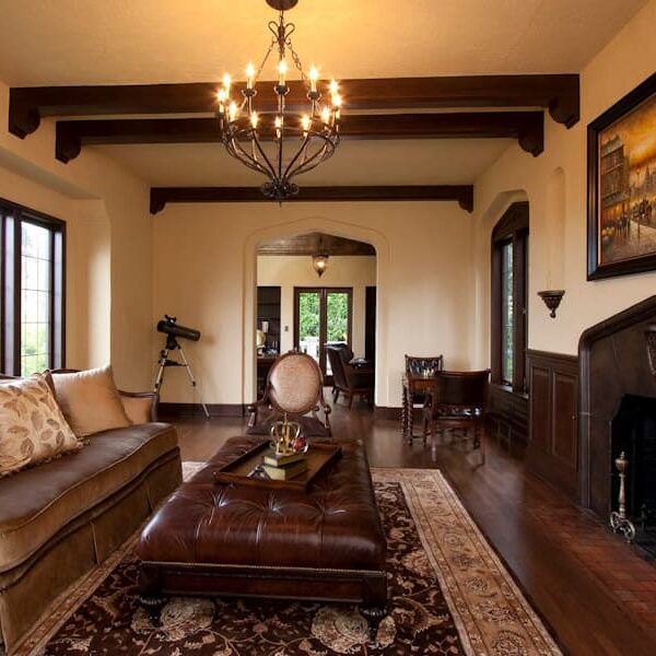 Freshly painted living room with wainscoting and open beams