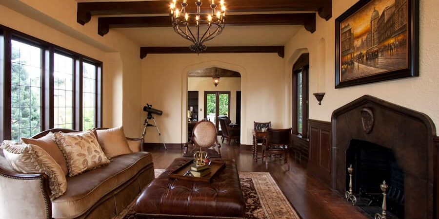 Freshly painted living room with wainscoting and open beams