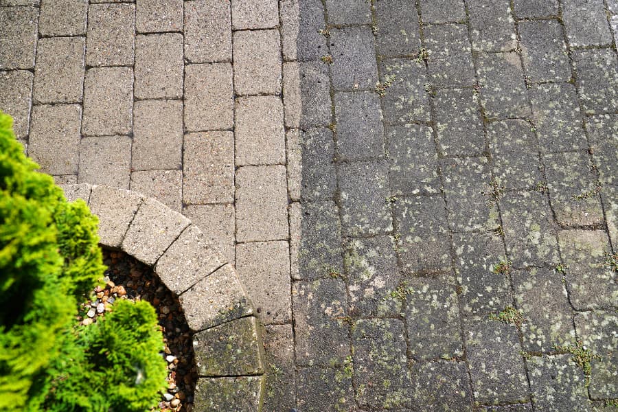Stone Slabs Outside With Half Power Washed And Half Unwashed Stone Slabs Outside With Half Power Washed And Half Unwashed