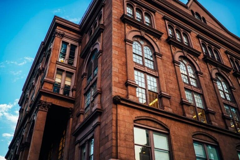 Historic Commercial Building With Architectural Façade And Large Windows