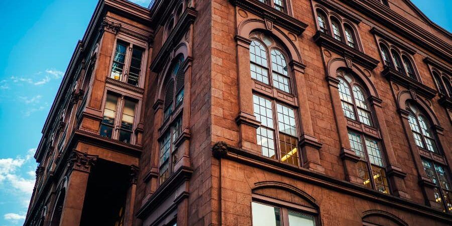 Historic Commercial Building With Architectural Façade And Large Windows Historic Commercial Building With Architectural Façade And Large Windows
